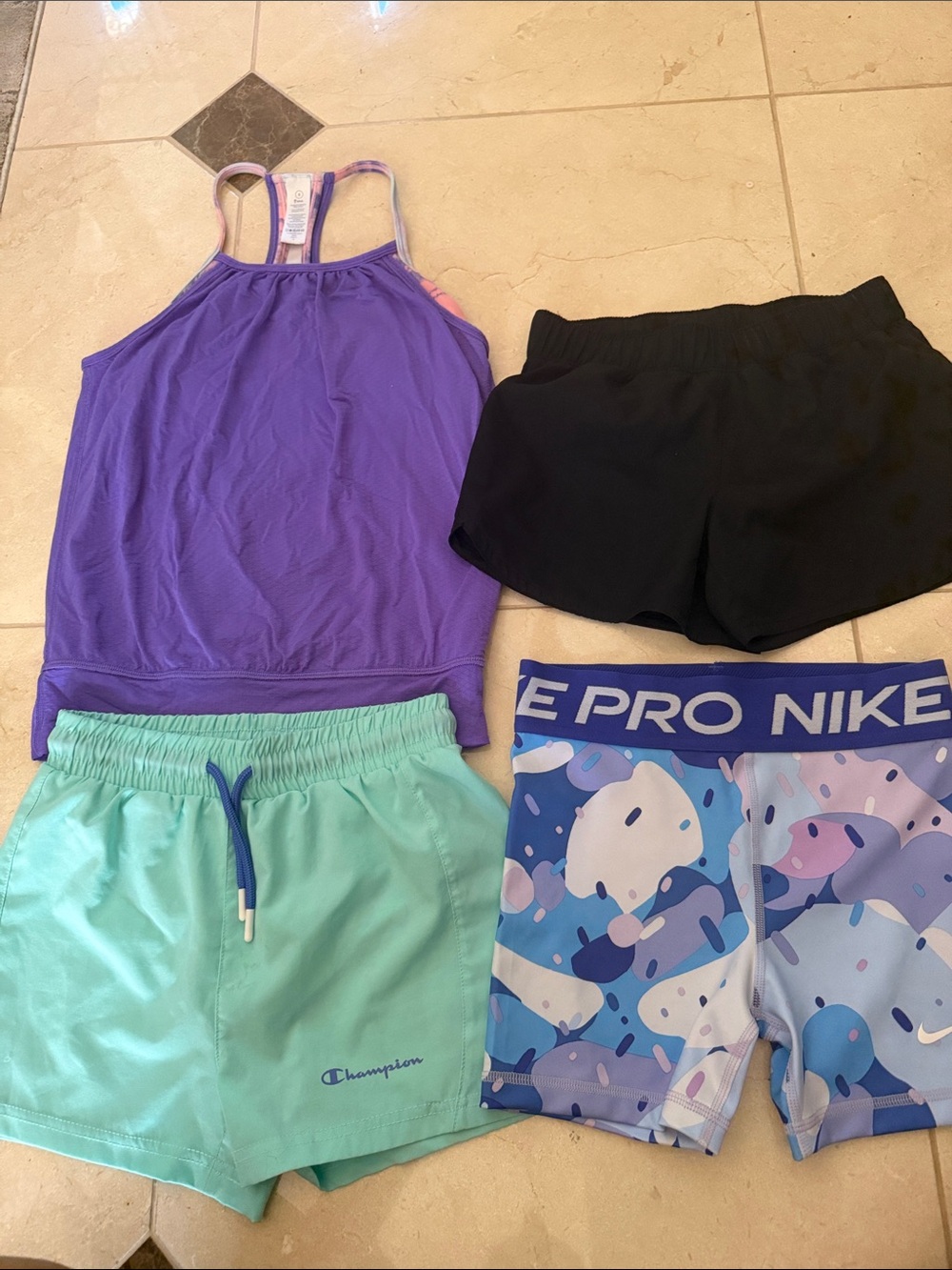 Lot of 4 activewear pieces girls size 7/8
